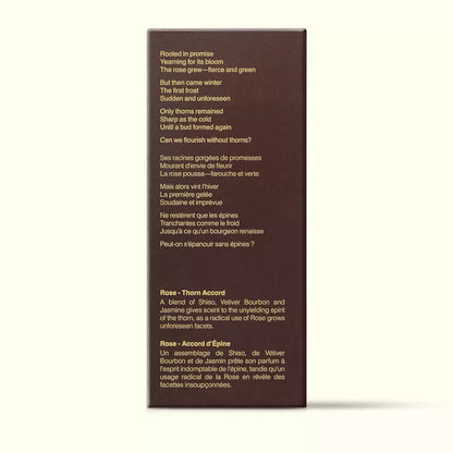Brown Aesop Rozu Arises fragrance box shown side-on with printed text on a white background.