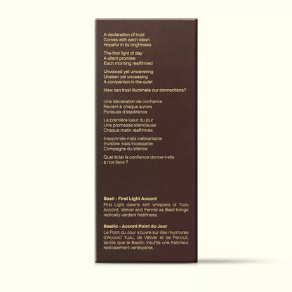 Brown Aesop Tacit Truths fragrance box shown side-on with printed text on a white background.