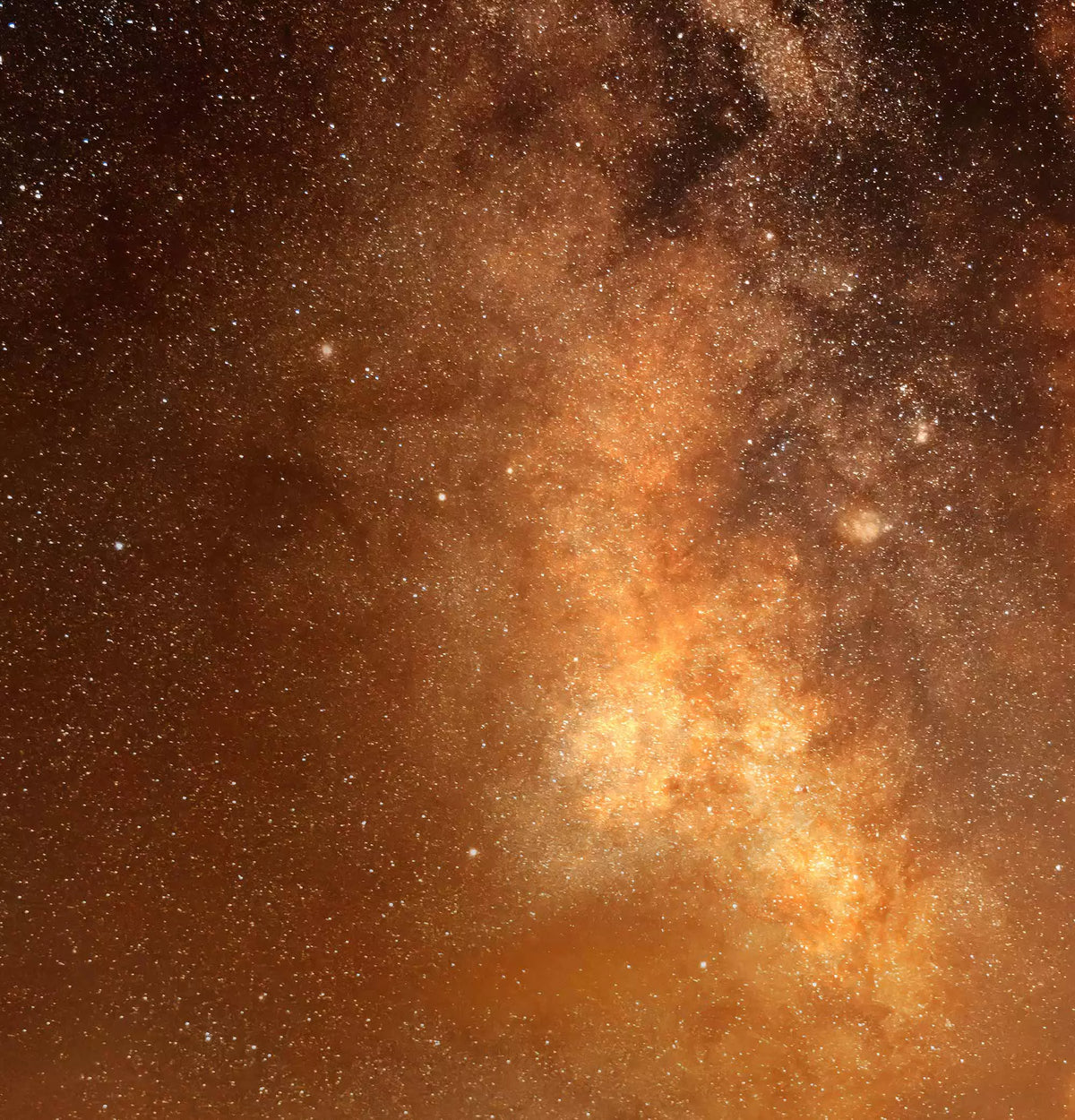 Glowing amber abstract backdrop with fine speckled texture.